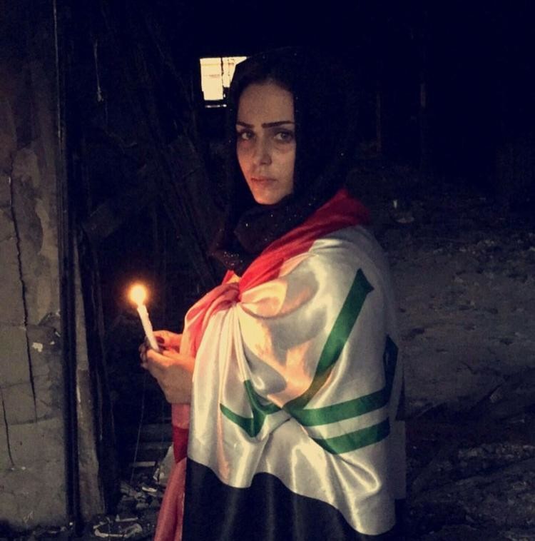 ملكة جمال العراق تقود مظاهرة وسط بغداد