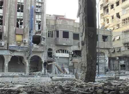 محلات ومباني دمرت في الضاحية التجارية بوسط حمص يوم السبت. تصوير: