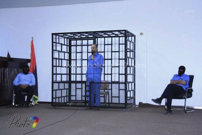 بالصور.. ليبيا تحاكم نجل القذافى ورئيس المخابرات السابق